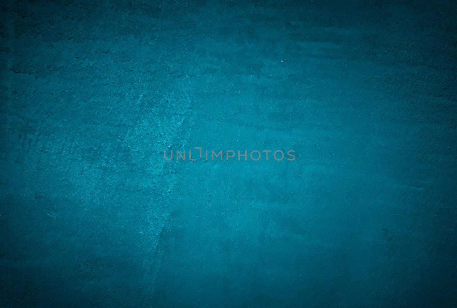 Vintage grunge blue concrete texture studio wall background with vignette. by Benzoix