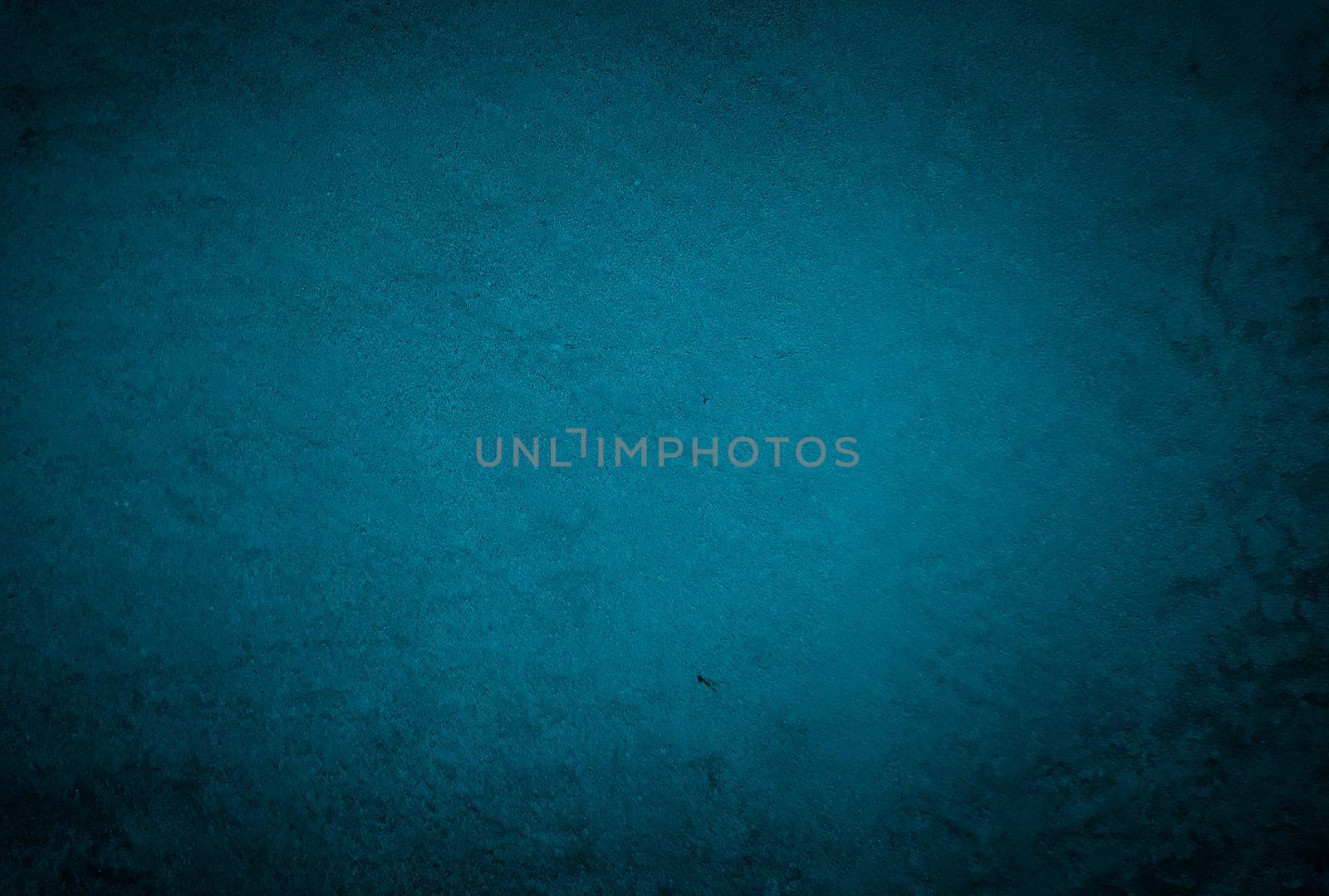 Vintage grunge blue concrete texture studio wall background with vignette