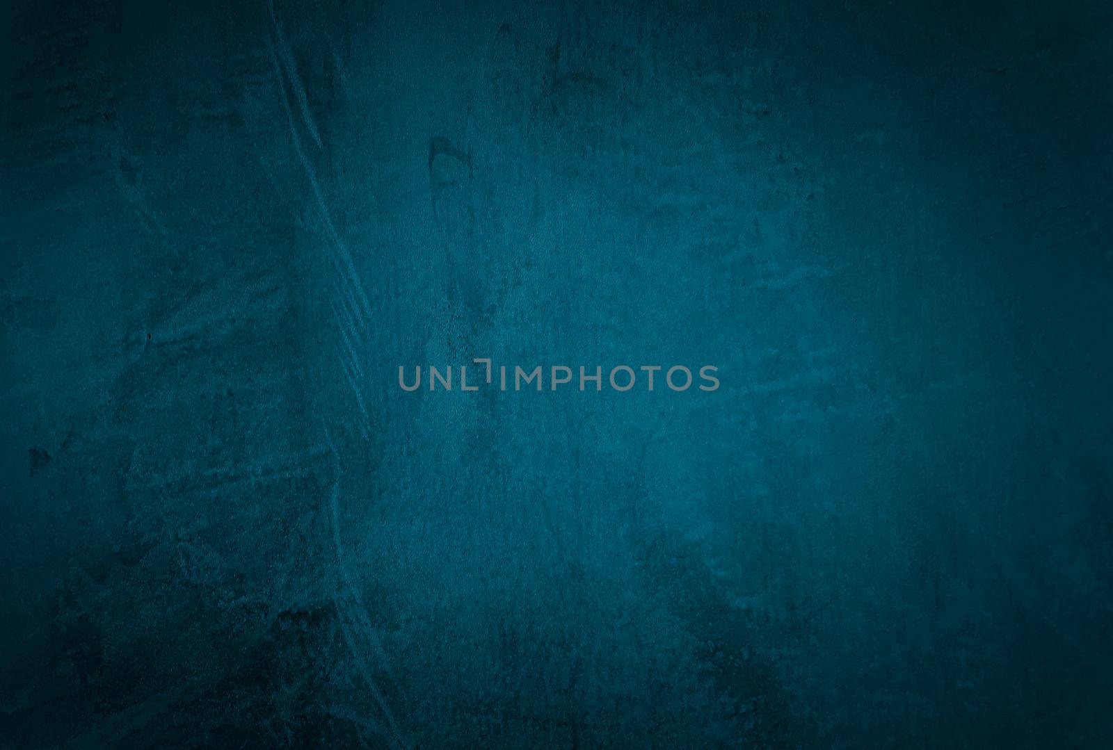 Vintage grunge blue concrete texture studio wall background with vignette. by Benzoix