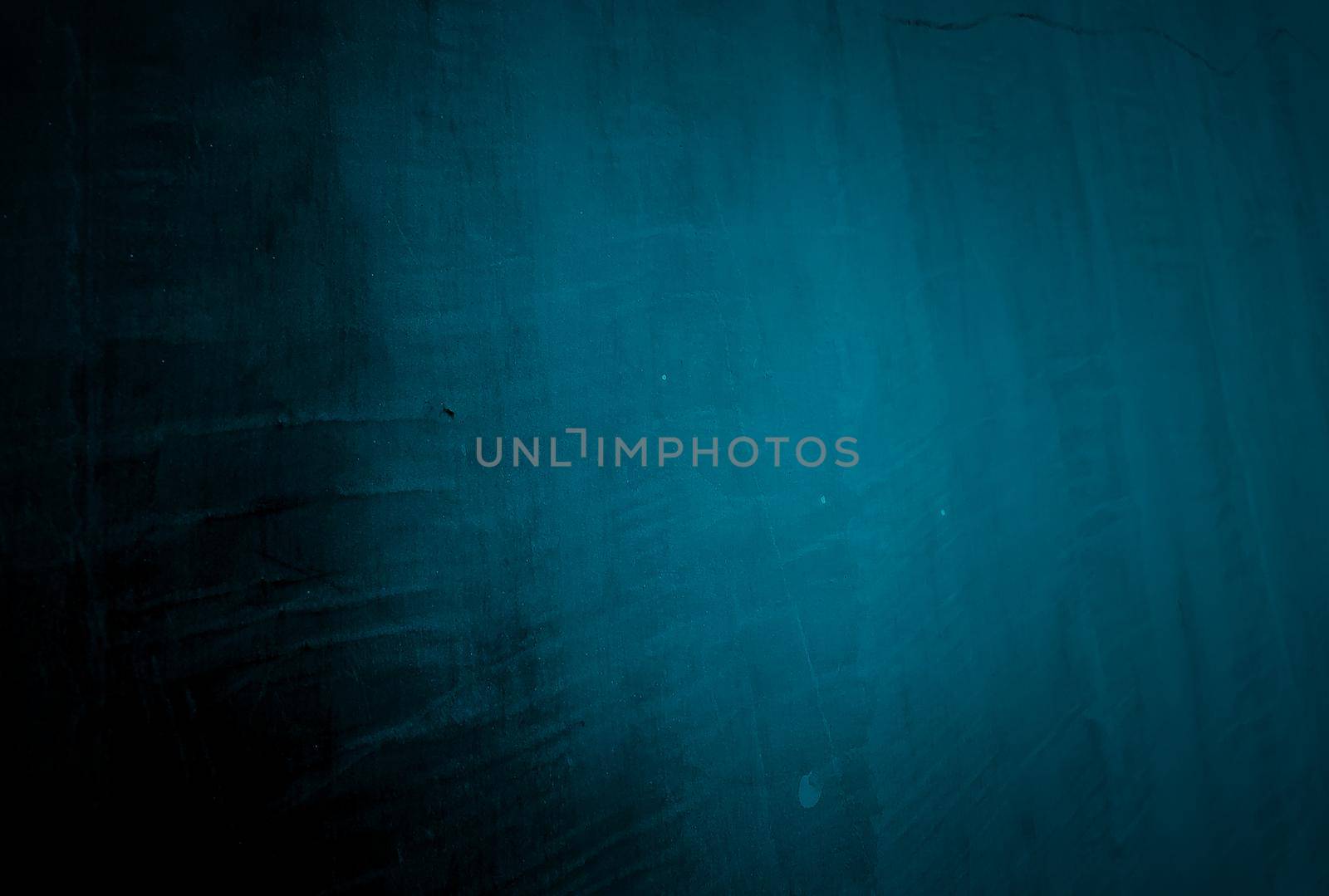 Vintage grunge blue concrete texture studio wall background with vignette. by Benzoix