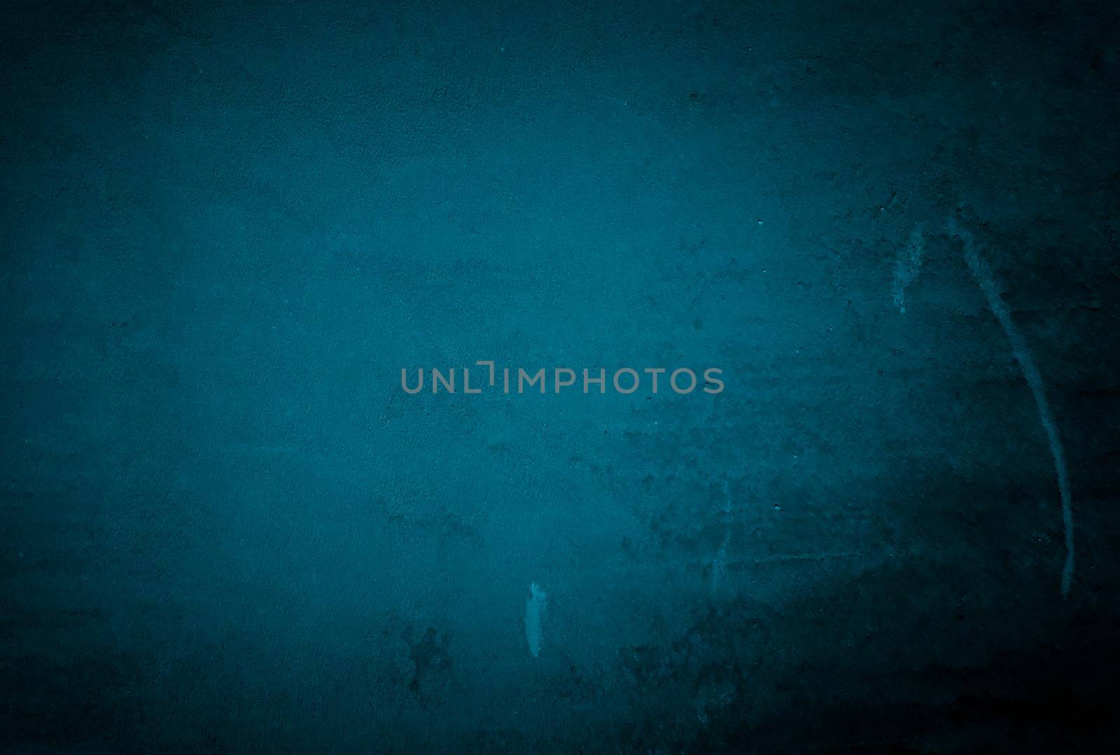 Vintage grunge blue concrete texture studio wall background with vignette