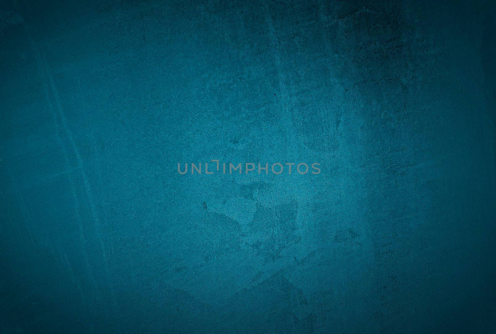 Vintage grunge blue concrete texture studio wall background with vignette. by Benzoix