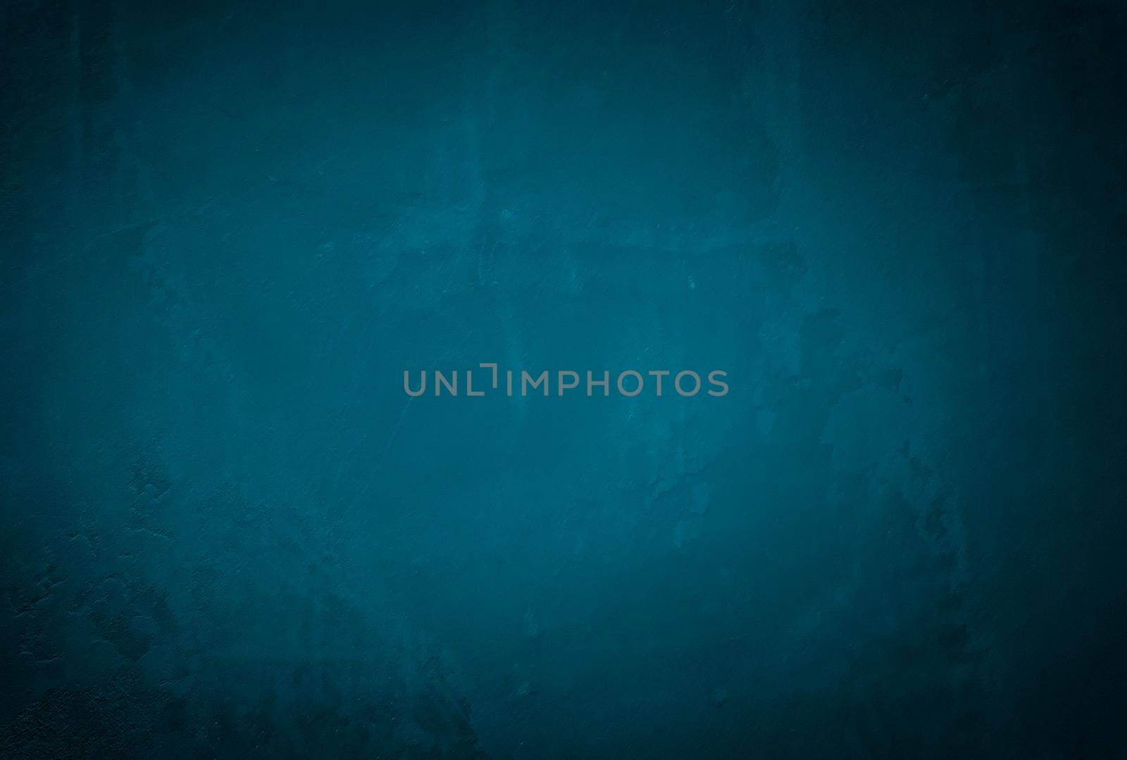 Vintage grunge blue concrete texture studio wall background with vignette. by Benzoix