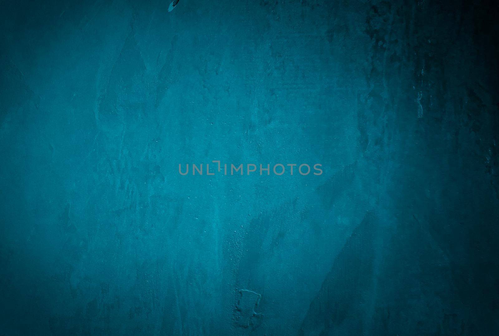 Vintage grunge blue concrete texture studio wall background with vignette. by Benzoix