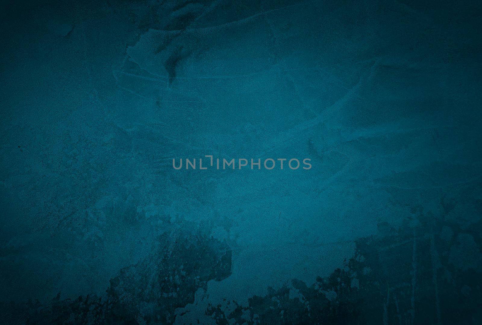 Vintage grunge blue concrete texture studio wall background with vignette. by Benzoix