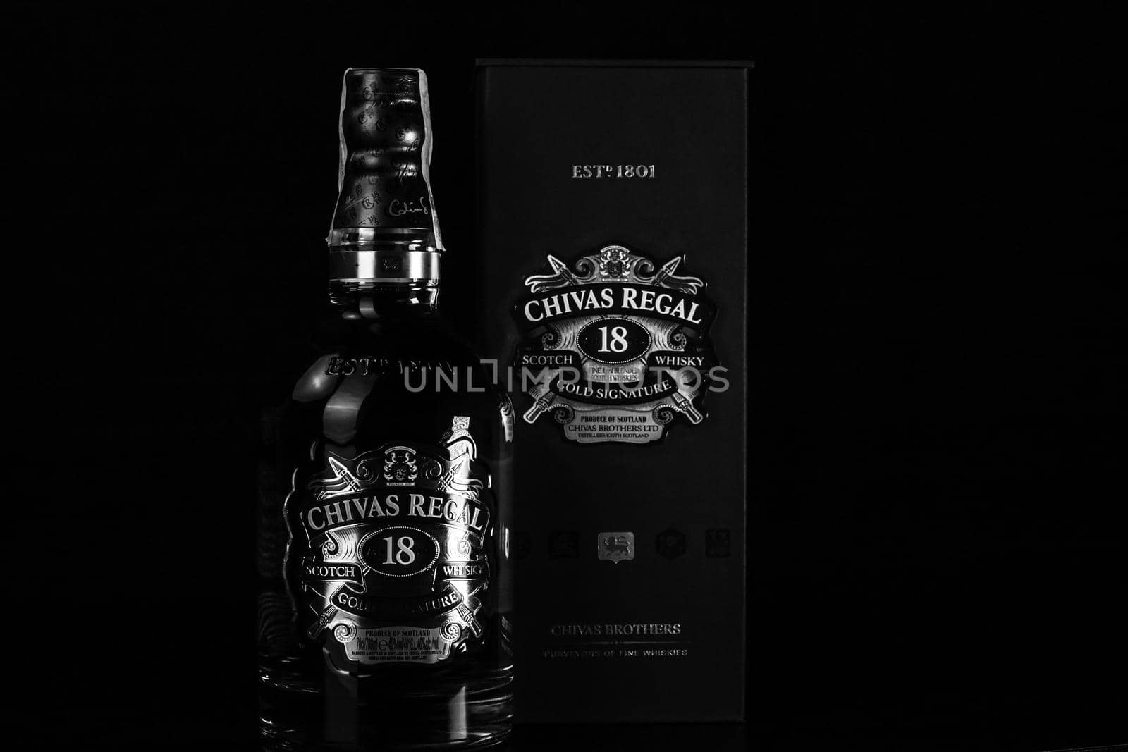 Chivas Regal 18 is blended from whiskies matured for at least 18 years. Whisky bottle on barrel. Illustrative editorial photo Bucharest, Romania, 2021