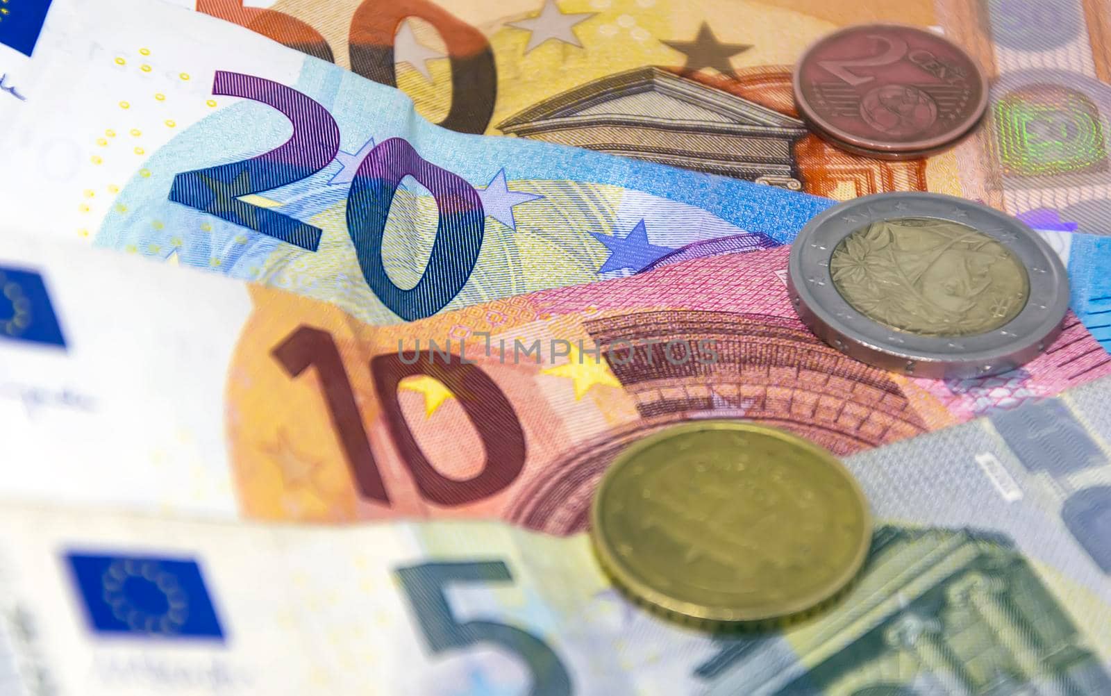 European Union coins and banknotes of different values. The euro is the European currency. Finance, economy and business. Cash and savings