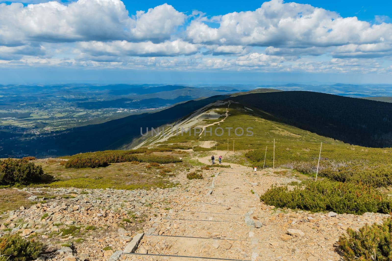 Long mountain trail with panorama of Karkonosze Giant Mountains around