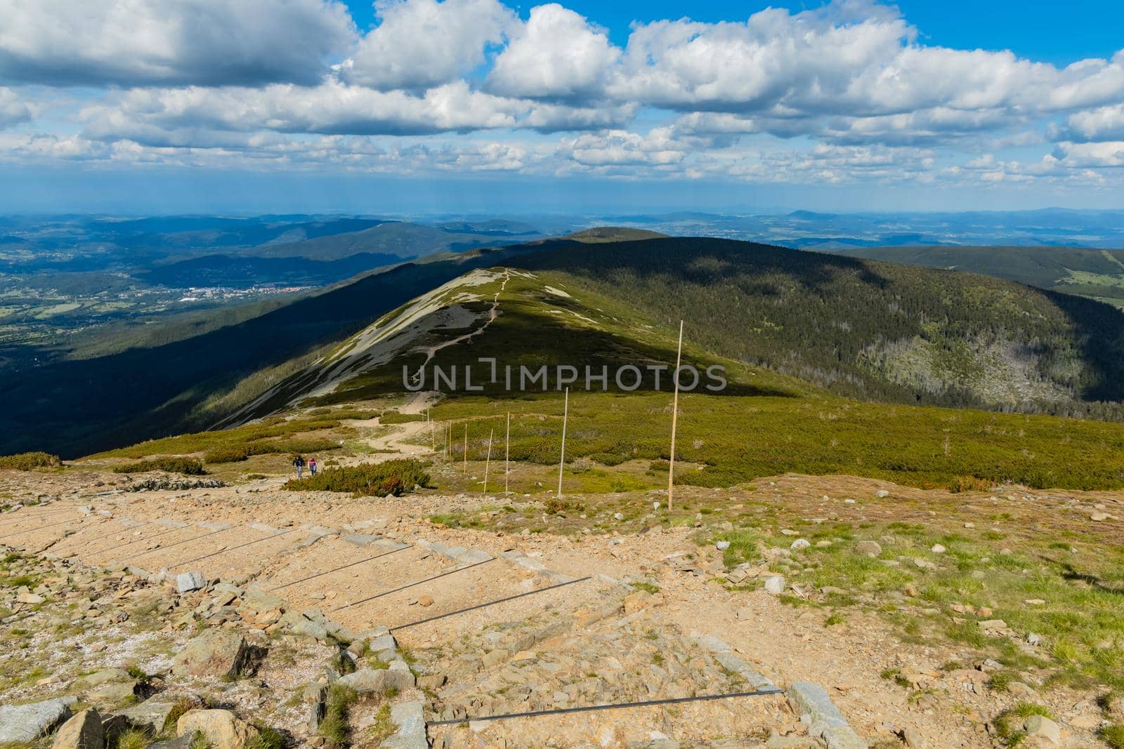 Long mountain trail with panorama of Karkonosze Giant Mountains around