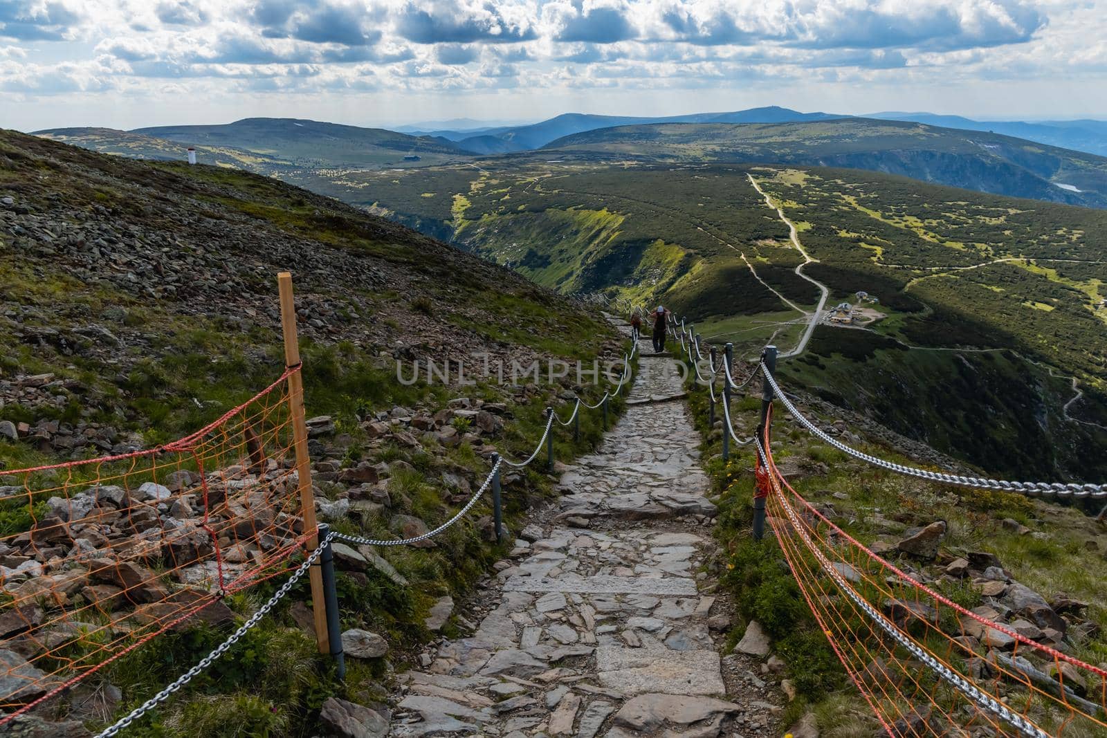 Long mountain trail with panorama of Karkonosze Giant Mountains around by Wierzchu