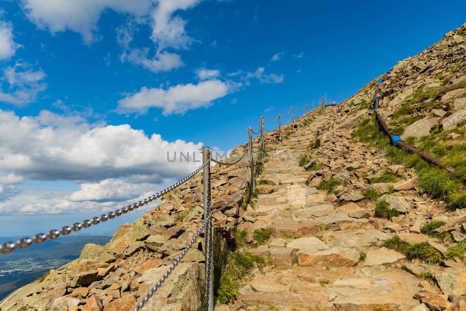 Long mountain trail with panorama of Karkonosze Giant Mountains around