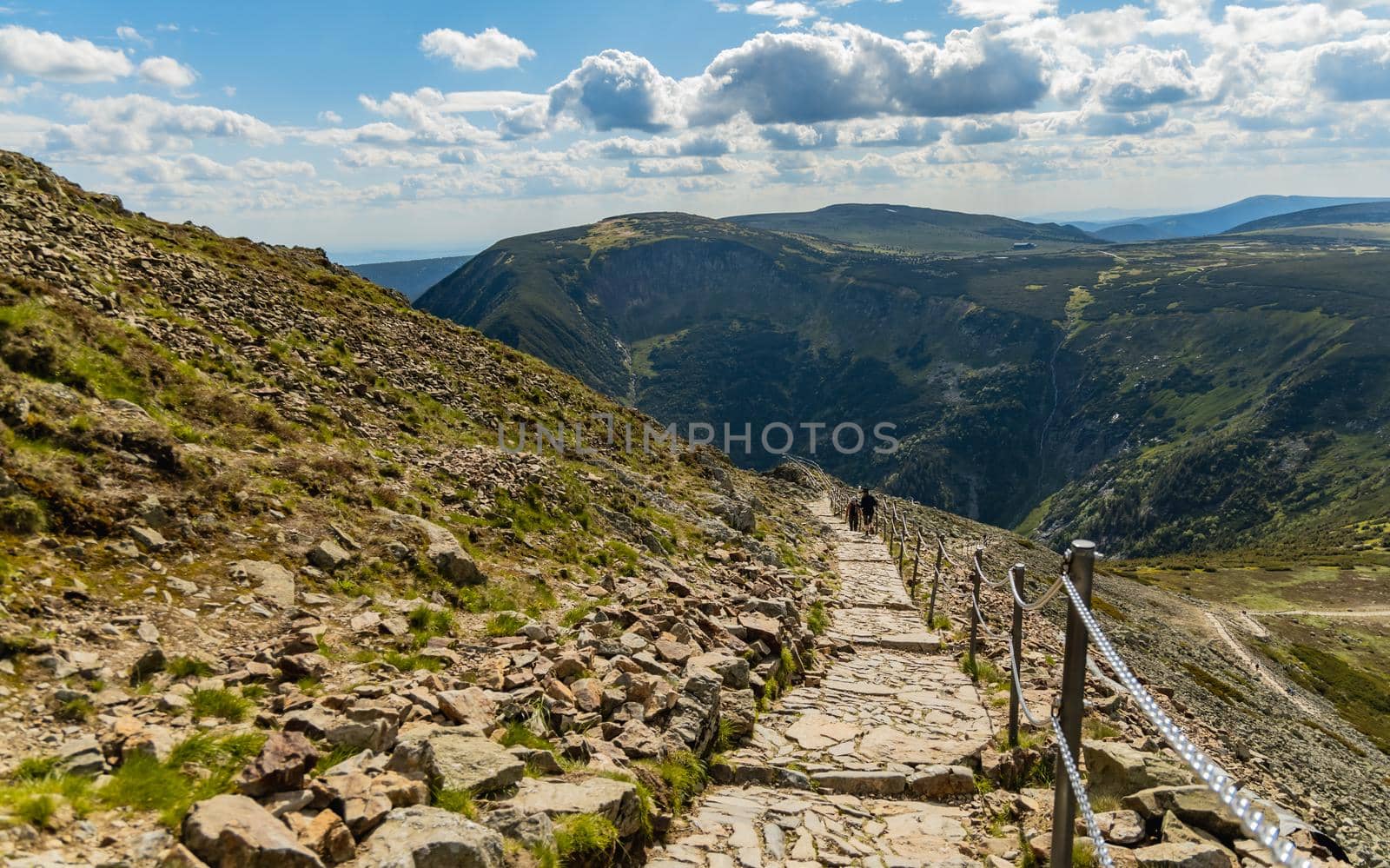 Long mountain trail with panorama of Karkonosze Giant Mountains around