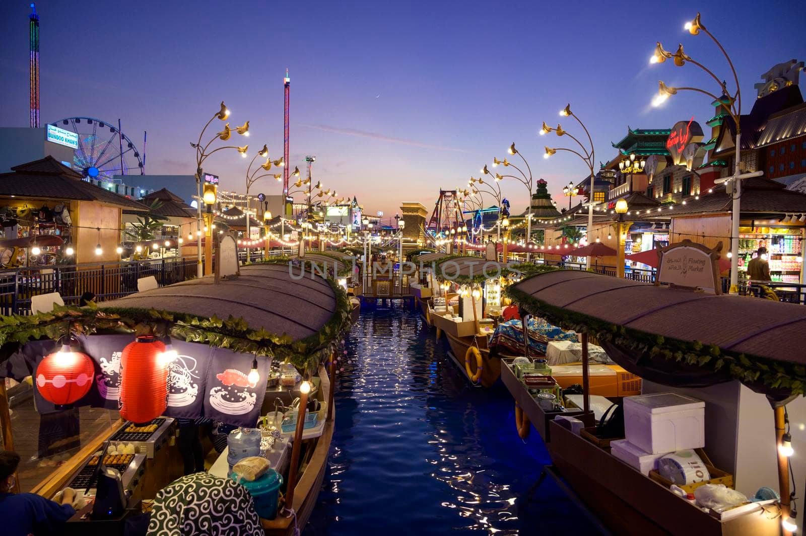 Dubai UAE, DEC 16 2020 Beautiful view of the Bangkok floating markets selling exotic Thai food in the park entertainment center captured in the sunset time at The Global Village, Dubai ,UAE.
