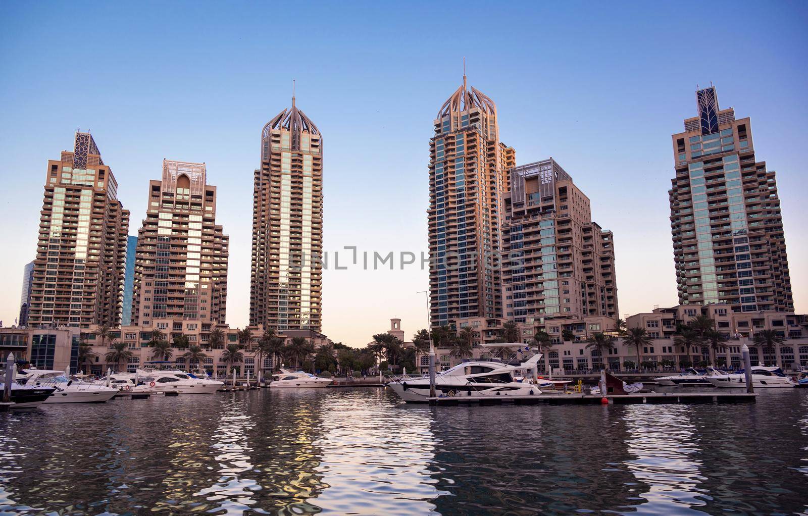 Dec 28th 2020, Dubai Marina. View of the beautiful sky scrappers, apartments, cruise ship deck and hotels captured during the evening time from the Marina mall ,Dubai, UAE.