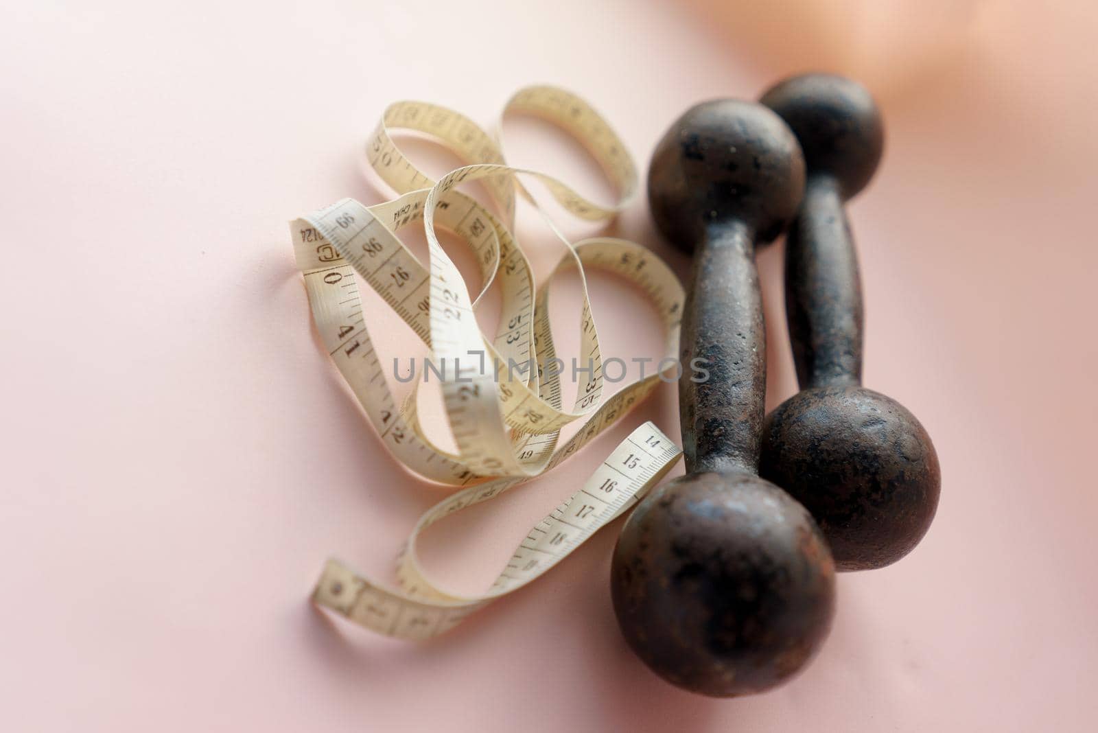 Diet Concept Slimming with Exercise, Black Drumbell on Floor, Fitness Sports
