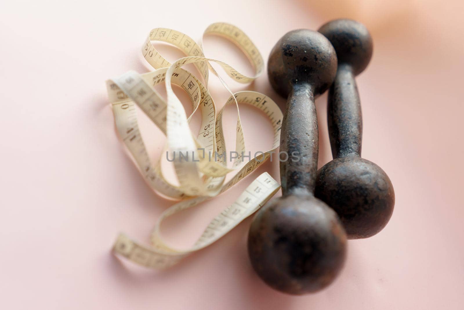 Diet Concept Slimming with Exercise, Black Drumbell on Floor, Fitness Sports
