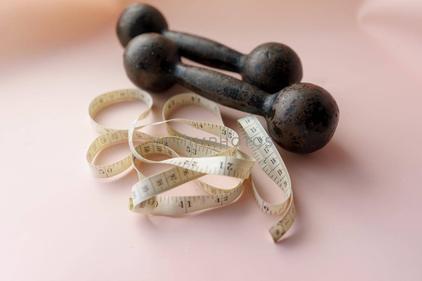 Diet Concept Slimming with Exercise, Black Drumbell on Floor, Fitness Sports