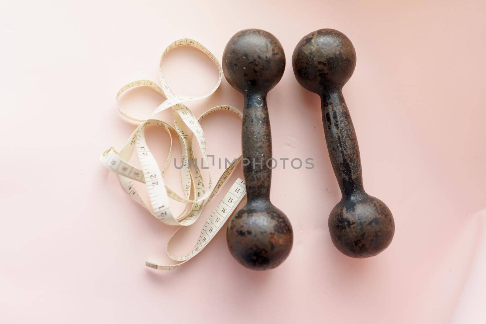 Diet Concept Slimming with Exercise, Black Drumbell on Floor, Fitness Sports