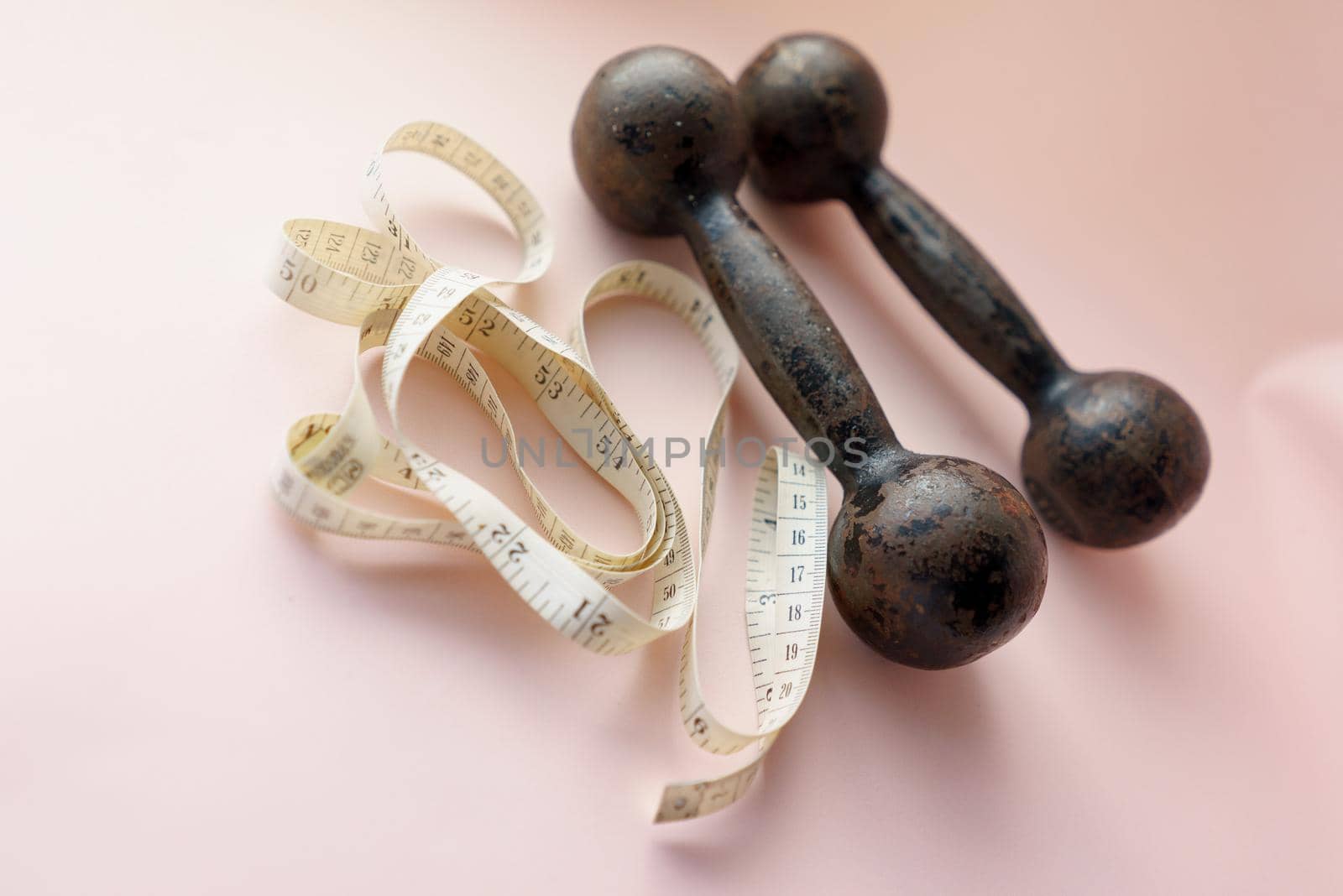 Diet Concept Slimming with Exercise, Black Drumbell on Floor, Fitness Sports