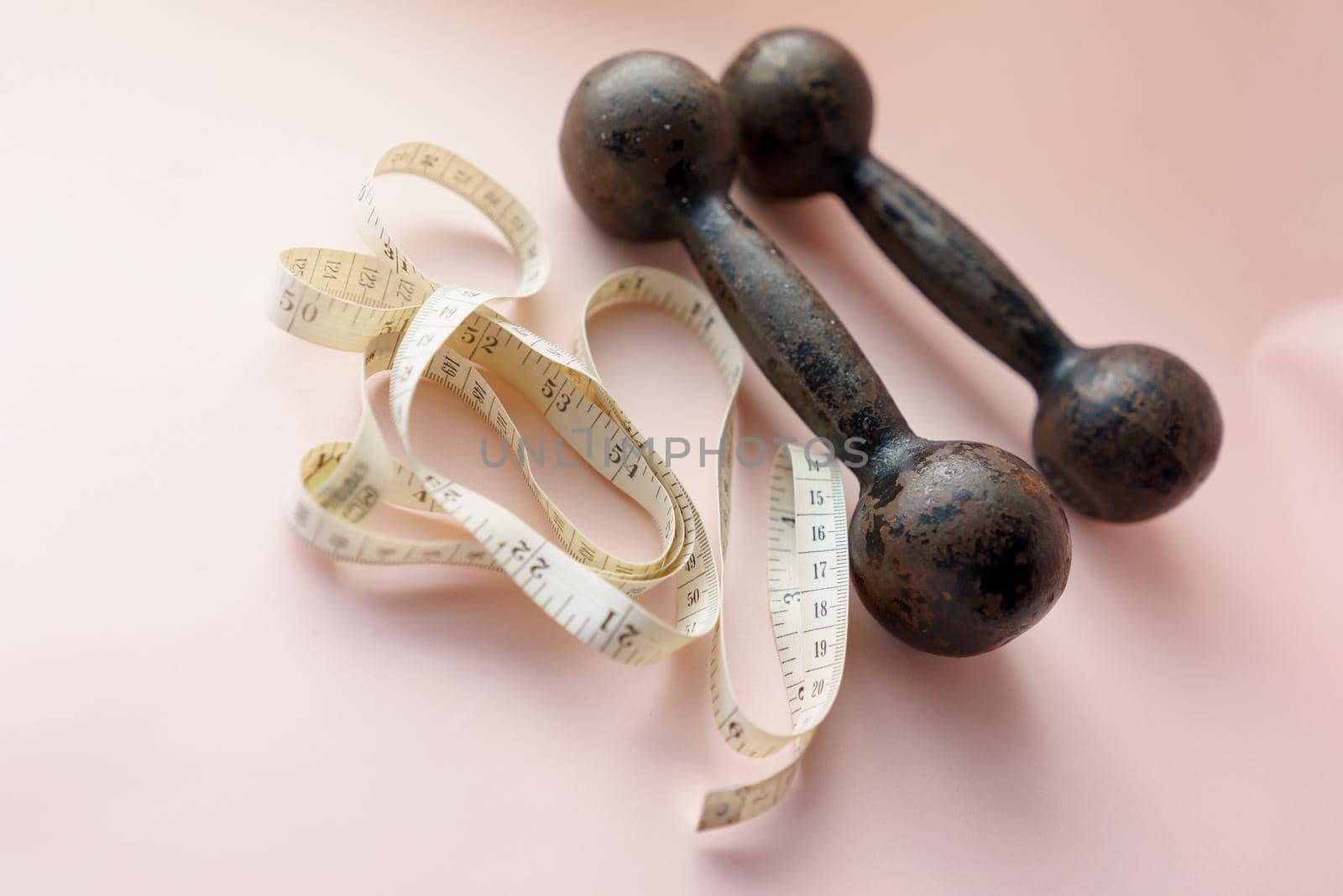 Diet Concept Slimming with Exercise, Black Drumbell on Floor, Fitness Sports