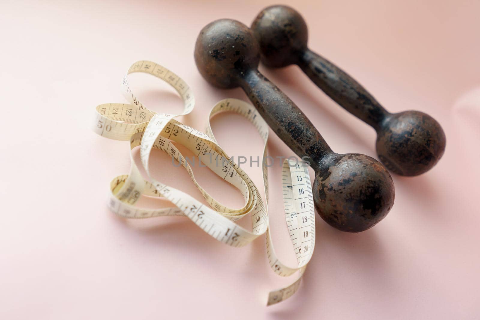 Diet Concept Slimming with Exercise, Black Drumbell on Floor, Fitness Sports