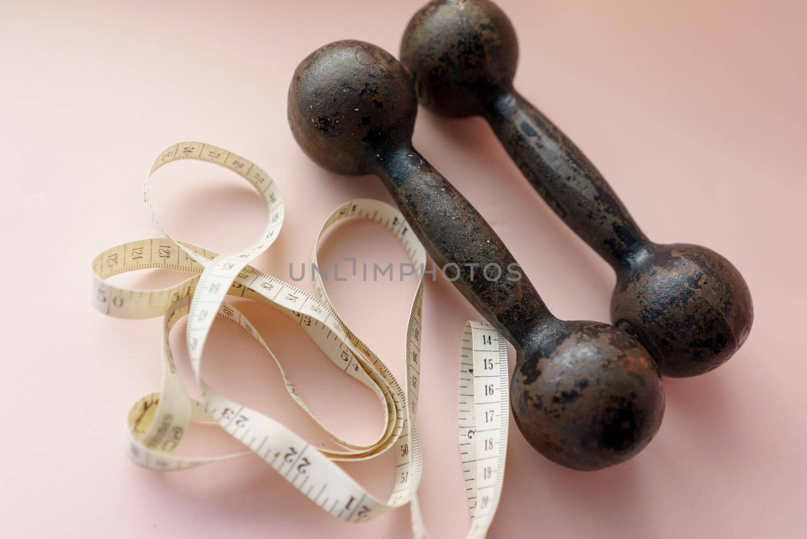 Diet Concept Slimming with Exercise, Black Drumbell on Floor, Fitness Sports