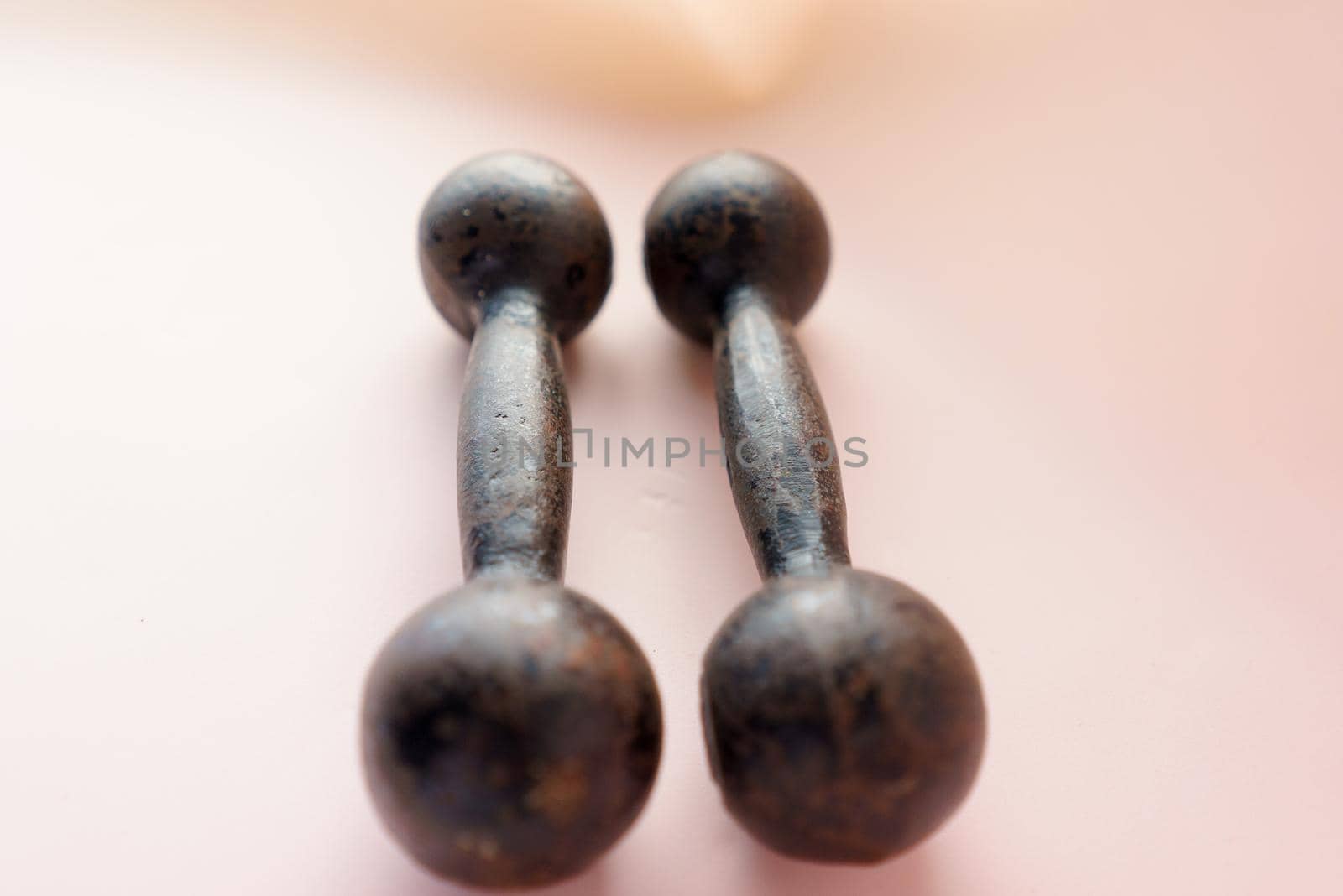 Diet Concept Slimming with Exercise, Black Drumbell on Floor, Fitness Sports