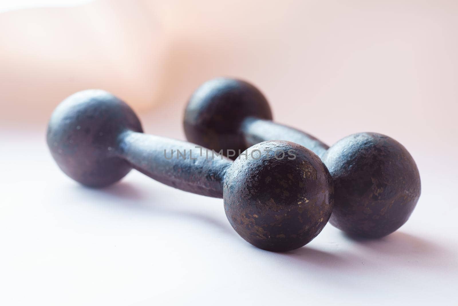 Diet Concept Slimming with Exercise, Black Drumbell on Floor, Fitness Sports