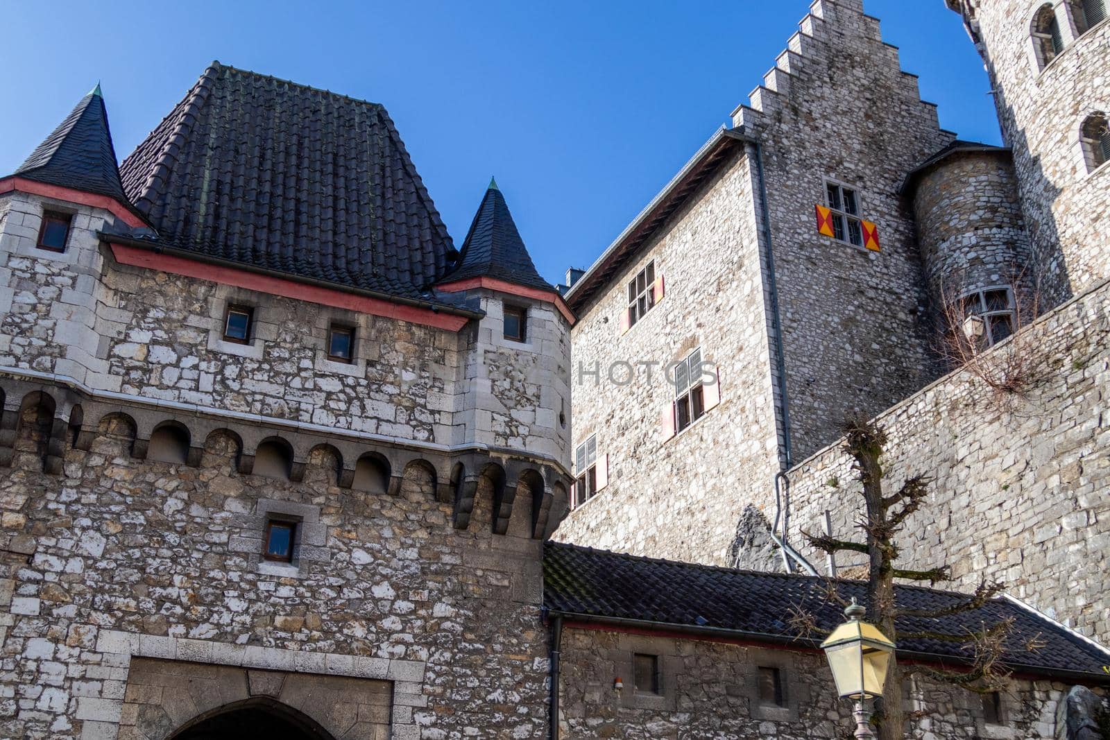 Low angle view at a tower of Stolberg castle in Stolberg, Eifel by reinerc