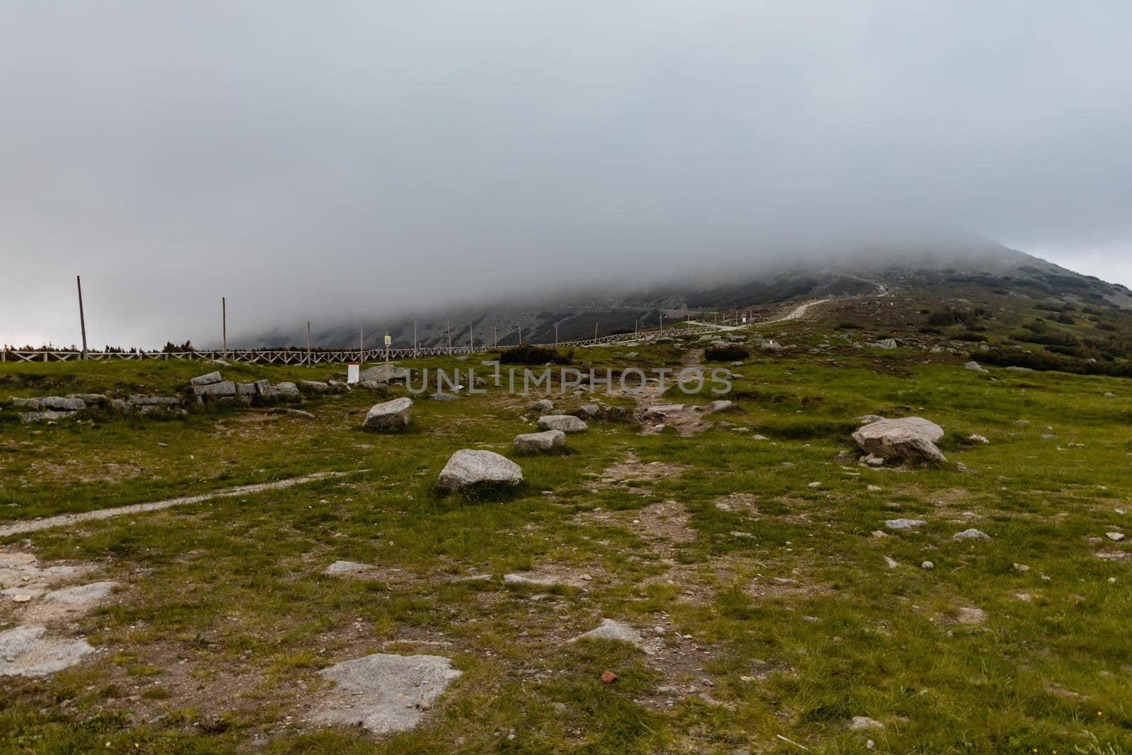 Long mountain trail with panorama of Karkonosze Giant Mountains around by Wierzchu