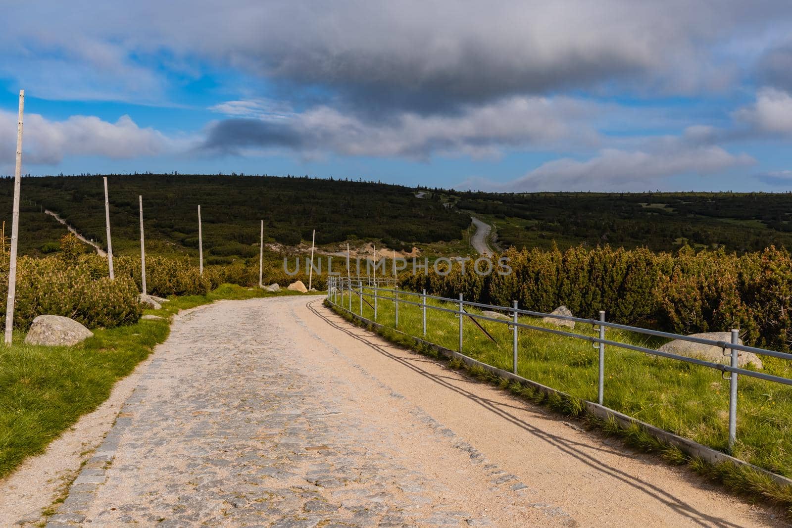 Long mountain trail with panorama of Karkonosze Giant Mountains around