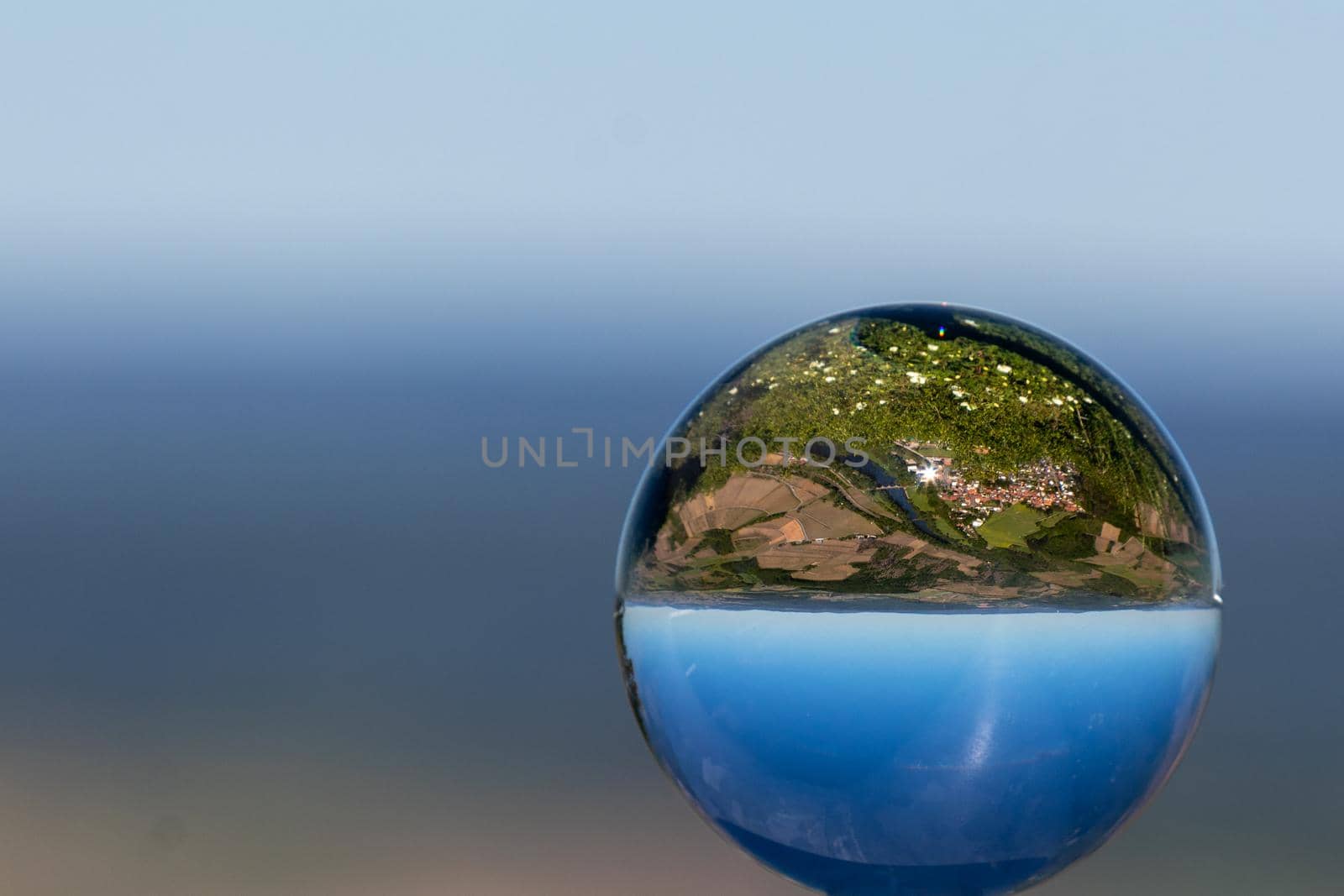 Crystal ball with view of landscape at river Nahe, Rhineland-Palatinate, Germany