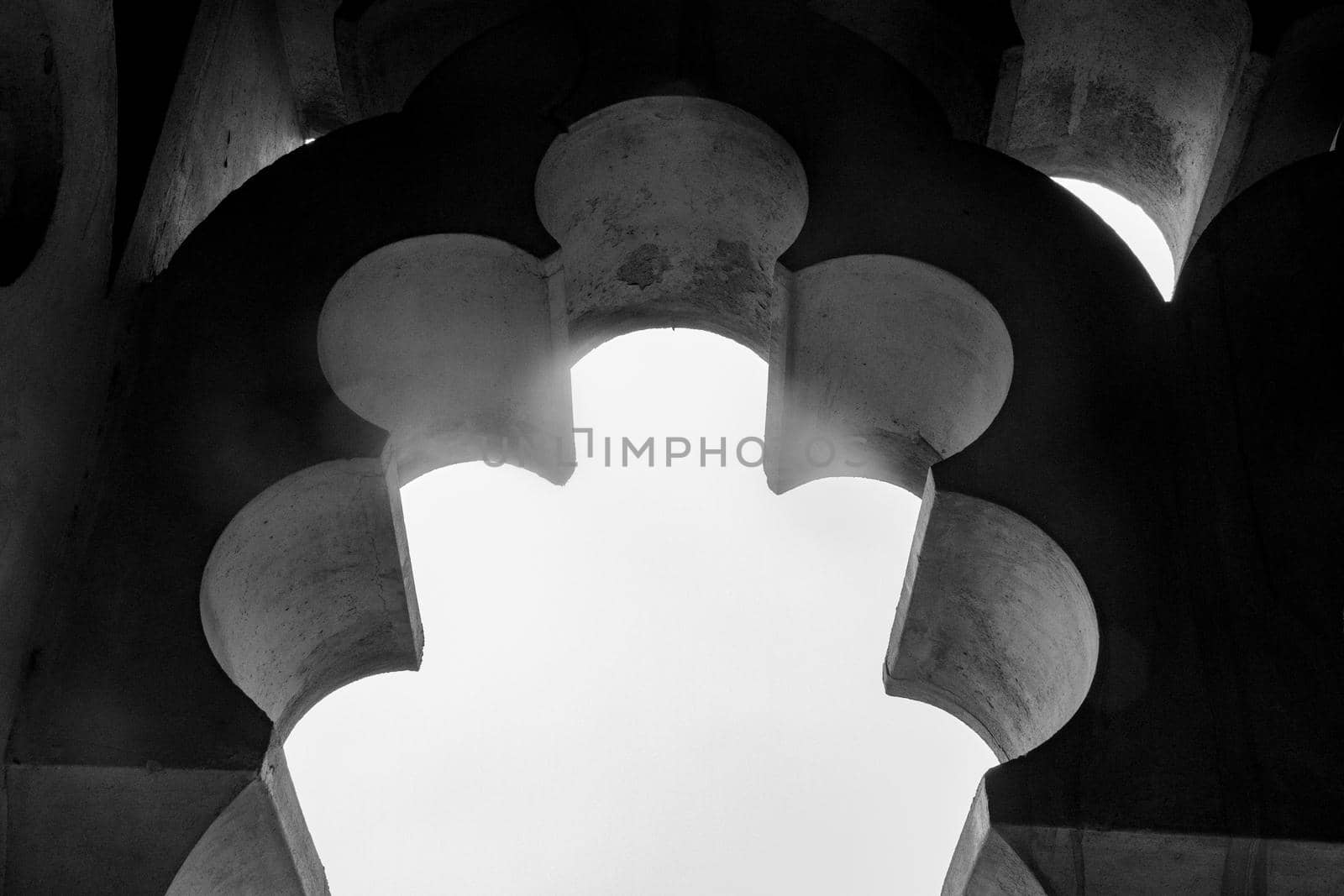 Detail of an Old Arch against a Bright Sky