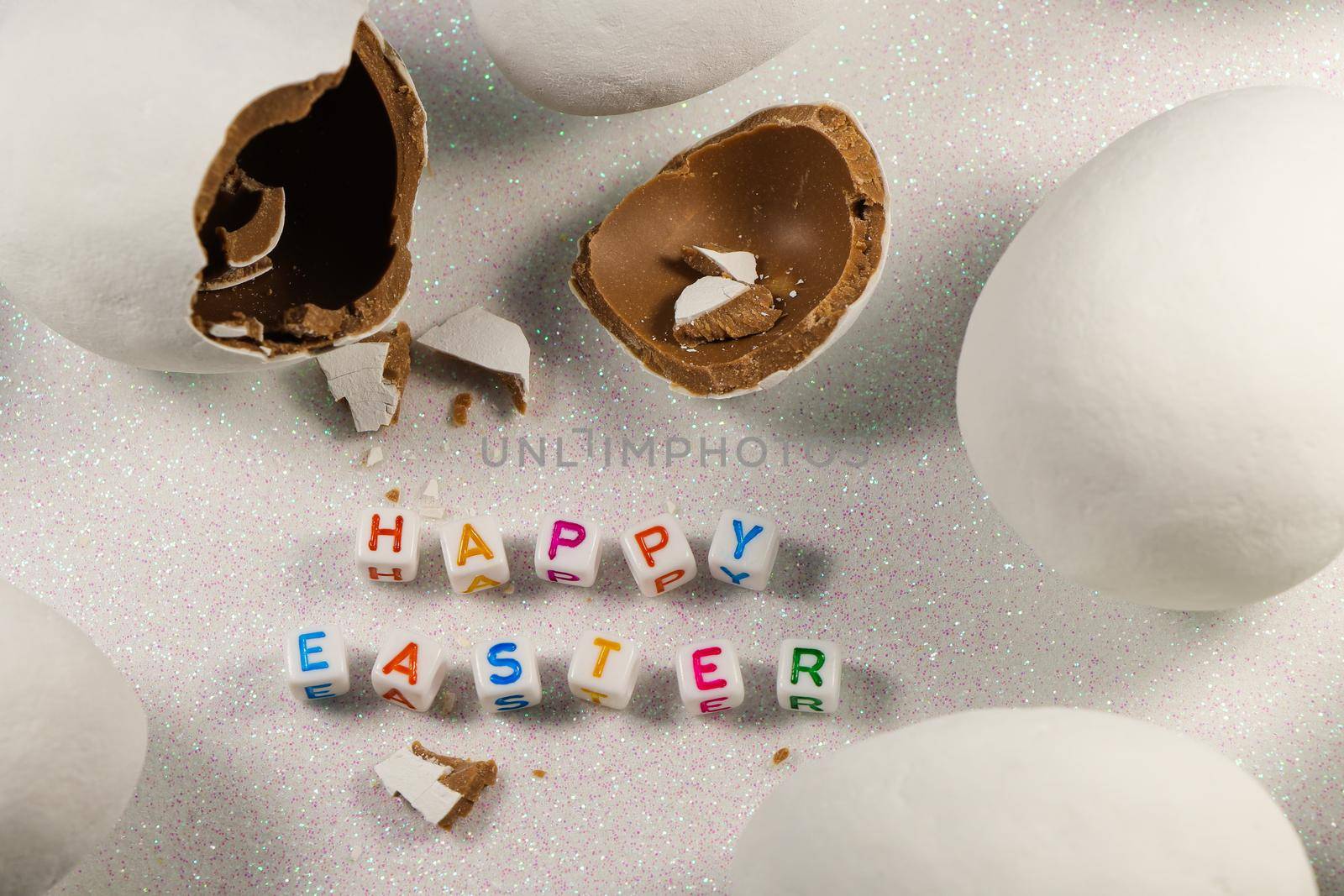 Happy Easter Broken Chocolate Candy Egg With Text by jjvanginkel