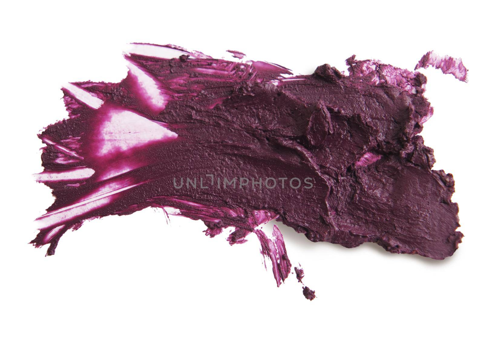 close up of a smudged lipstick on white background