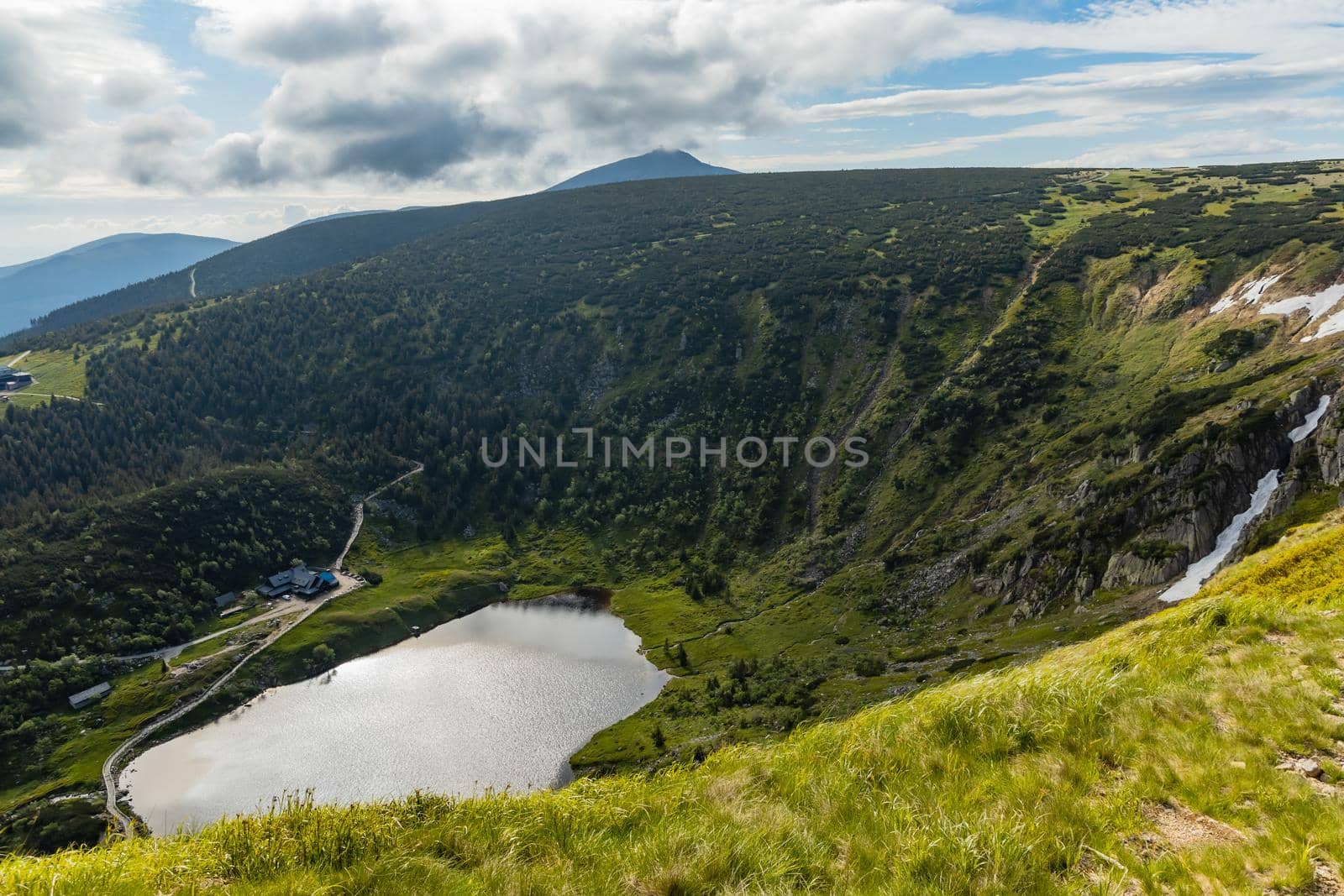 Small pond down to mountain trail in Giant Mountains next to Samotnia mountain shelter by Wierzchu