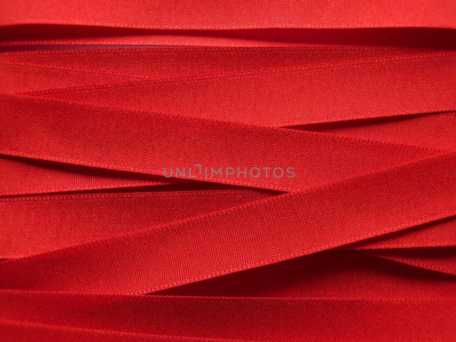Shiny red satin ribbon background