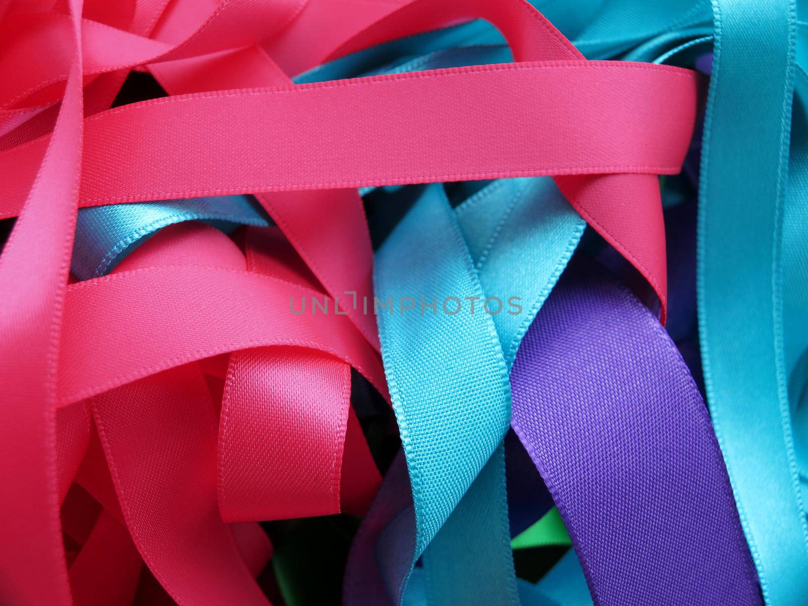 Colorful ribbons over white background, design element.