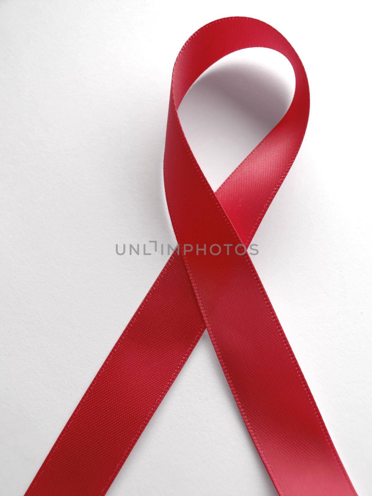 red ribbon aids awareness isolated on white background. Clipping Path included