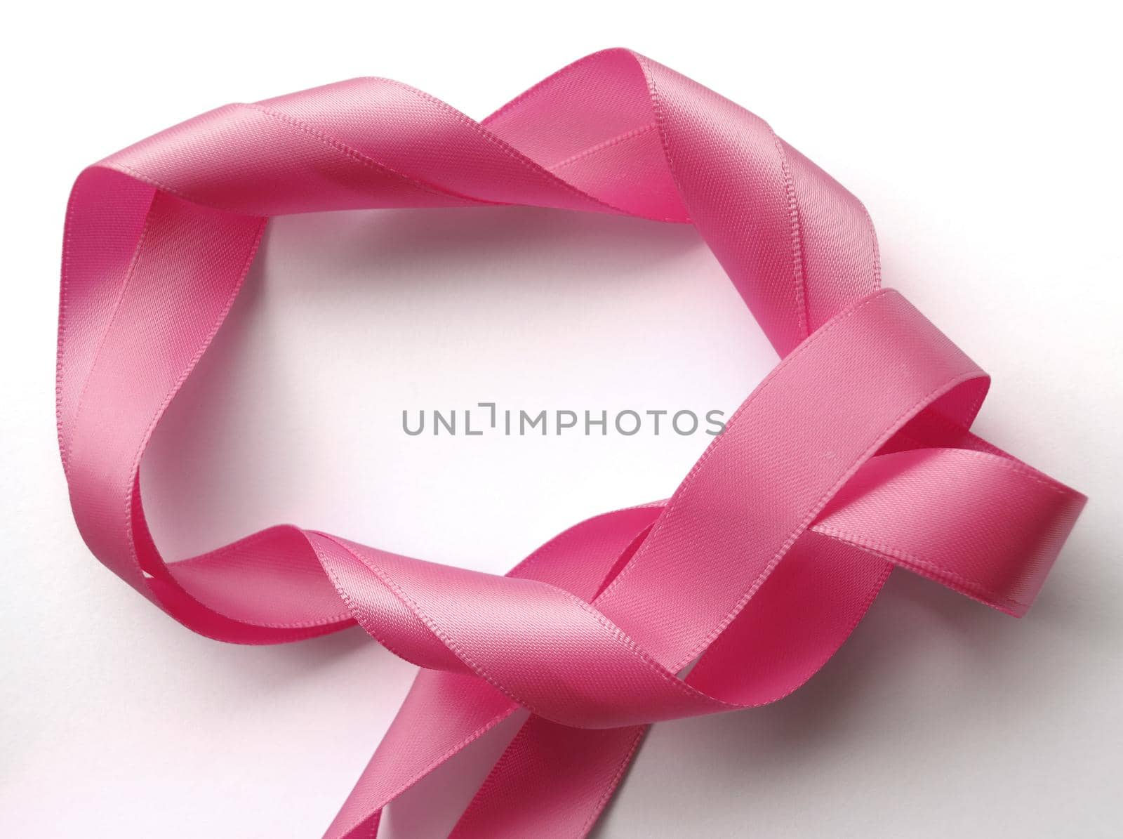 Pink ribbon over white background, design element by aroas