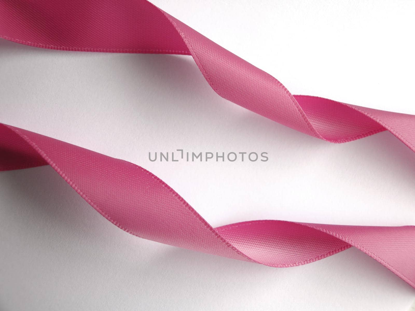 Pink ribbon over white background, design element by aroas