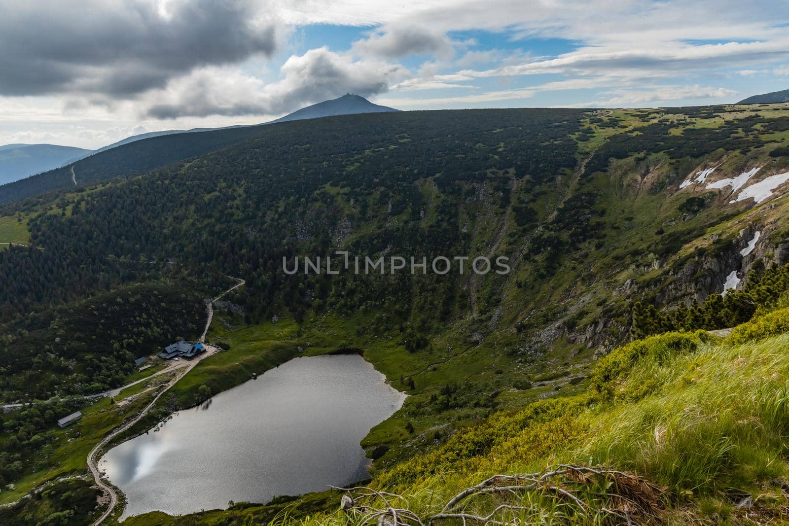 Small pond down to mountain trail in Giant Mountains next to Samotnia mountain shelter by Wierzchu