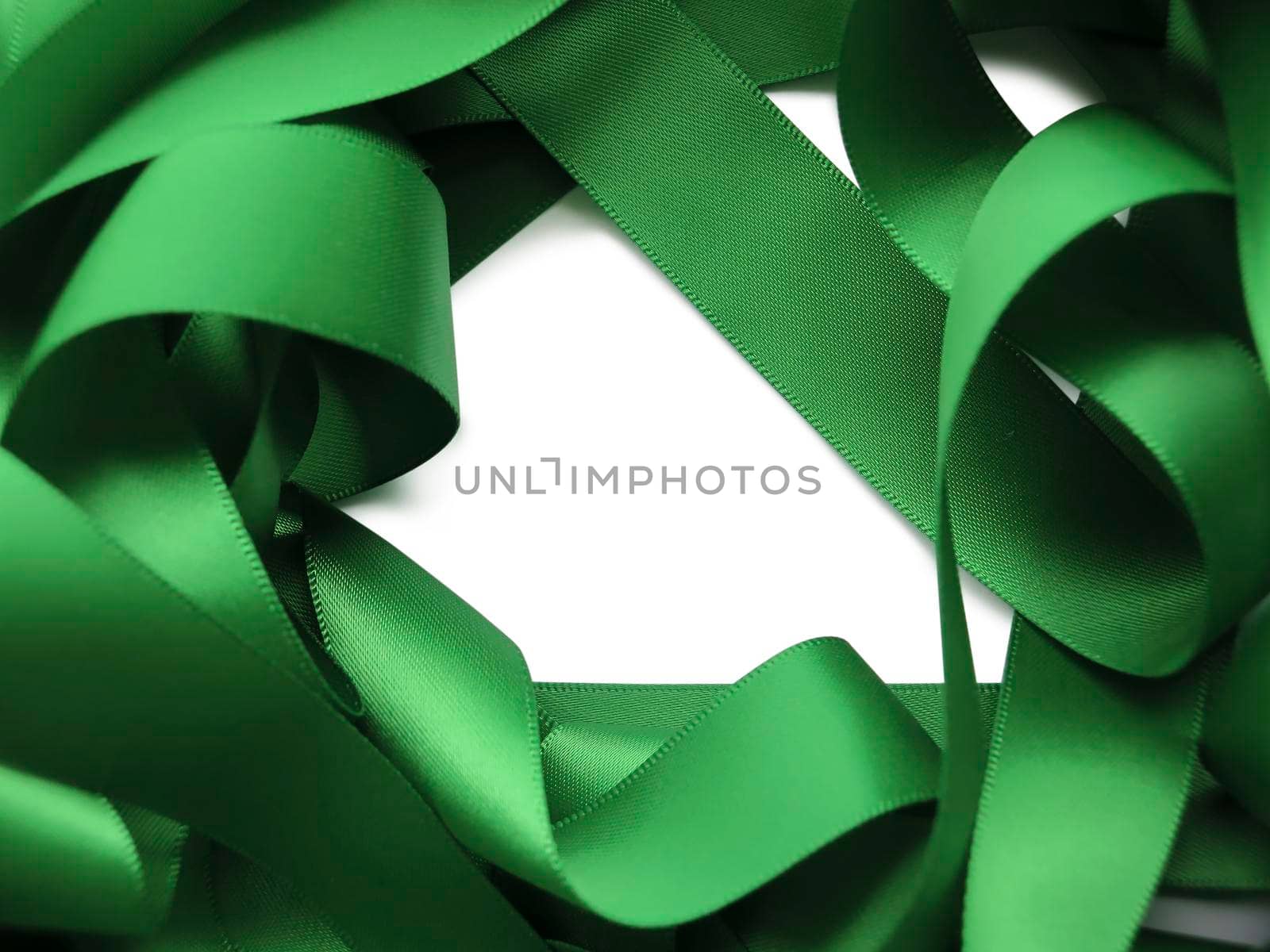 Green ribbon over white background, design element. Clipping Path included