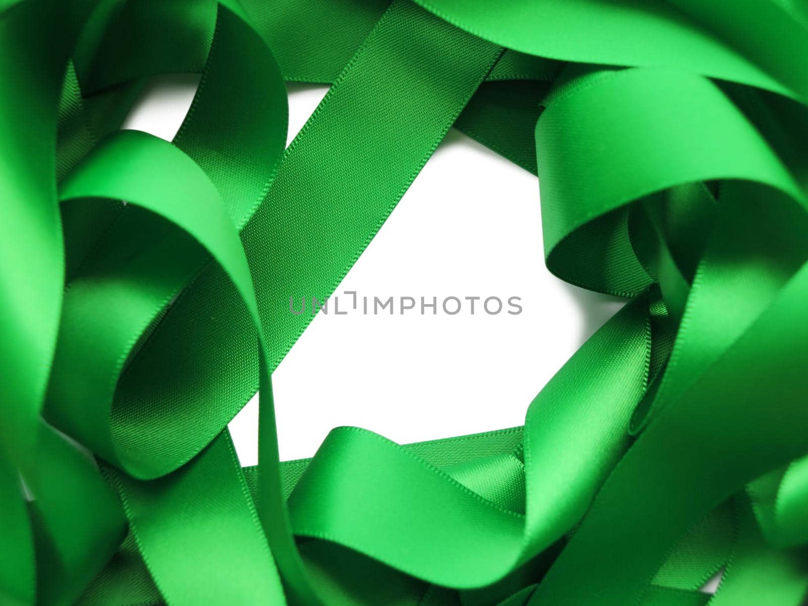 Green ribbon over white background, design element by aroas