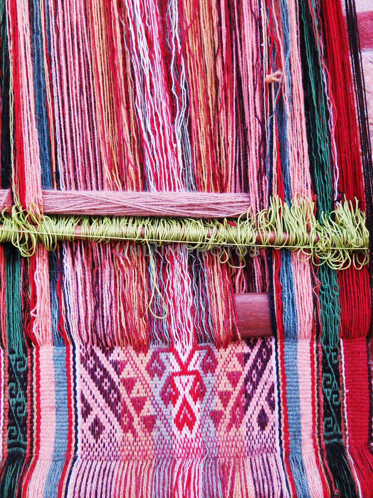 Natural dyed wool yarn in the peruvian Andes at Cuzco by aroas