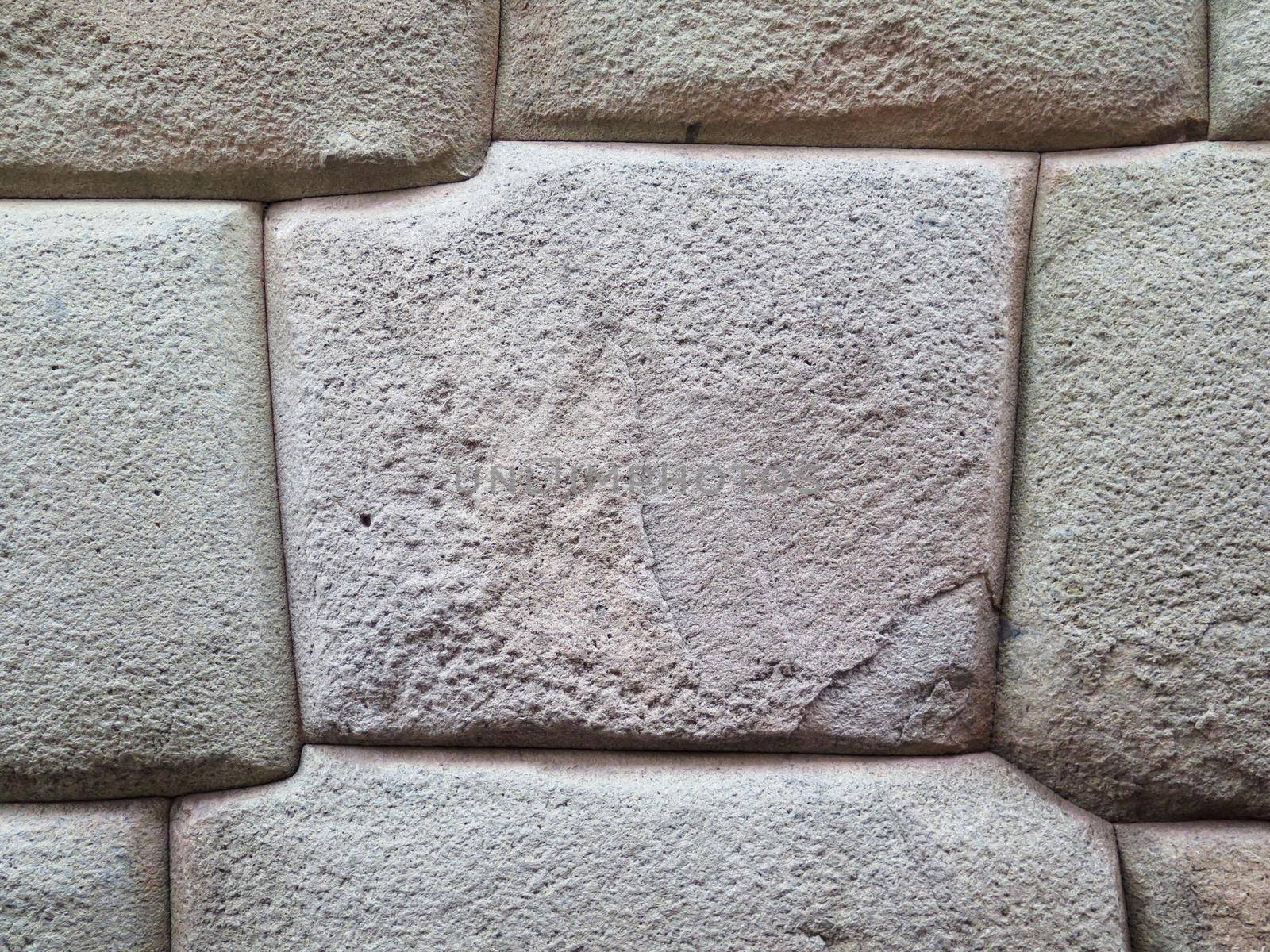 Inca wall made of natural volcanic stones. Cusco Peru by aroas