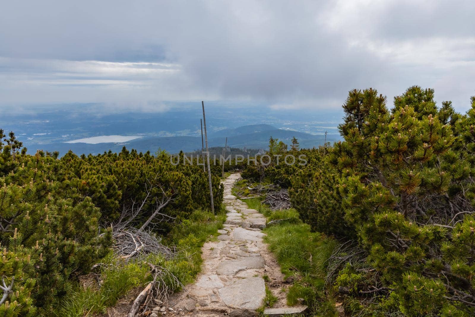 Long mountain trail with panorama of Karkonosze Giant Mountains around