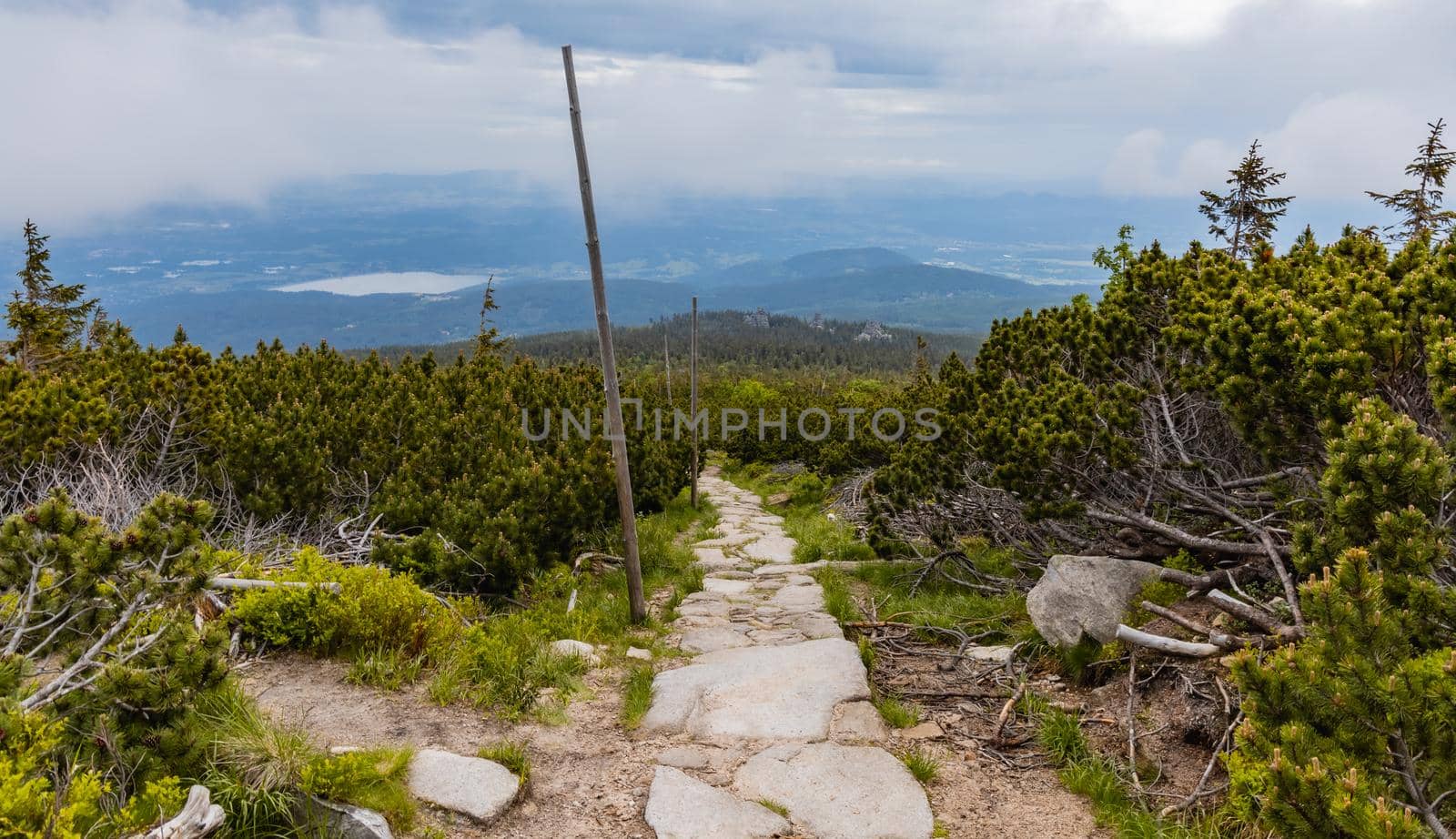 Long mountain trail with panorama of Karkonosze Giant Mountains around