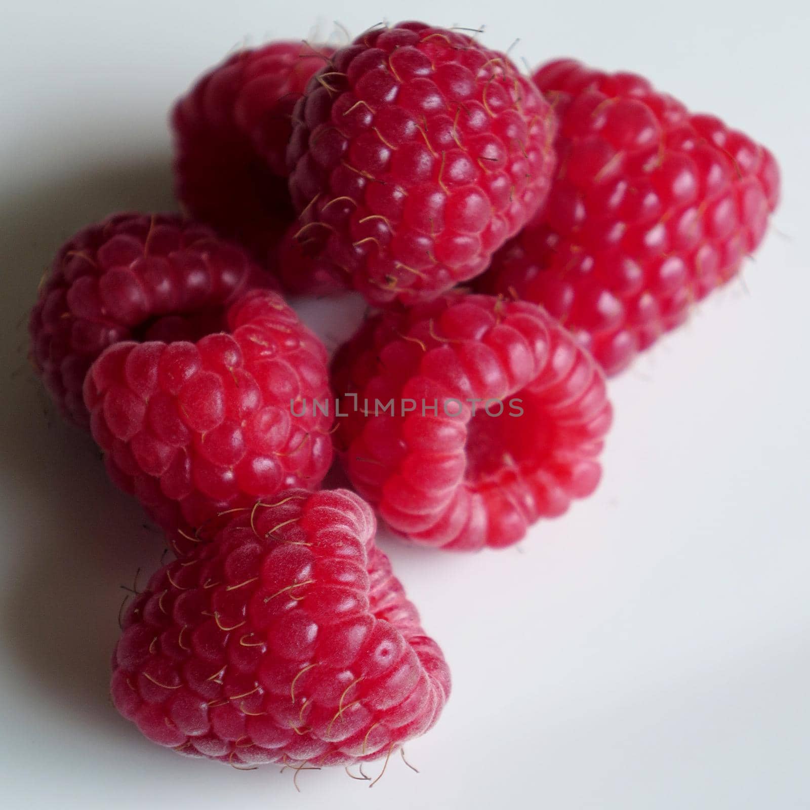 beautiful ripe raspberries by aroas