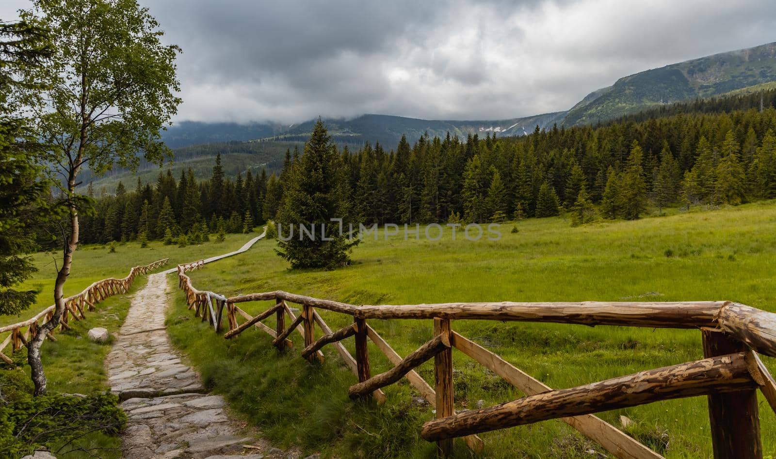 Long mountain trail with panorama of Karkonosze Giant Mountains around